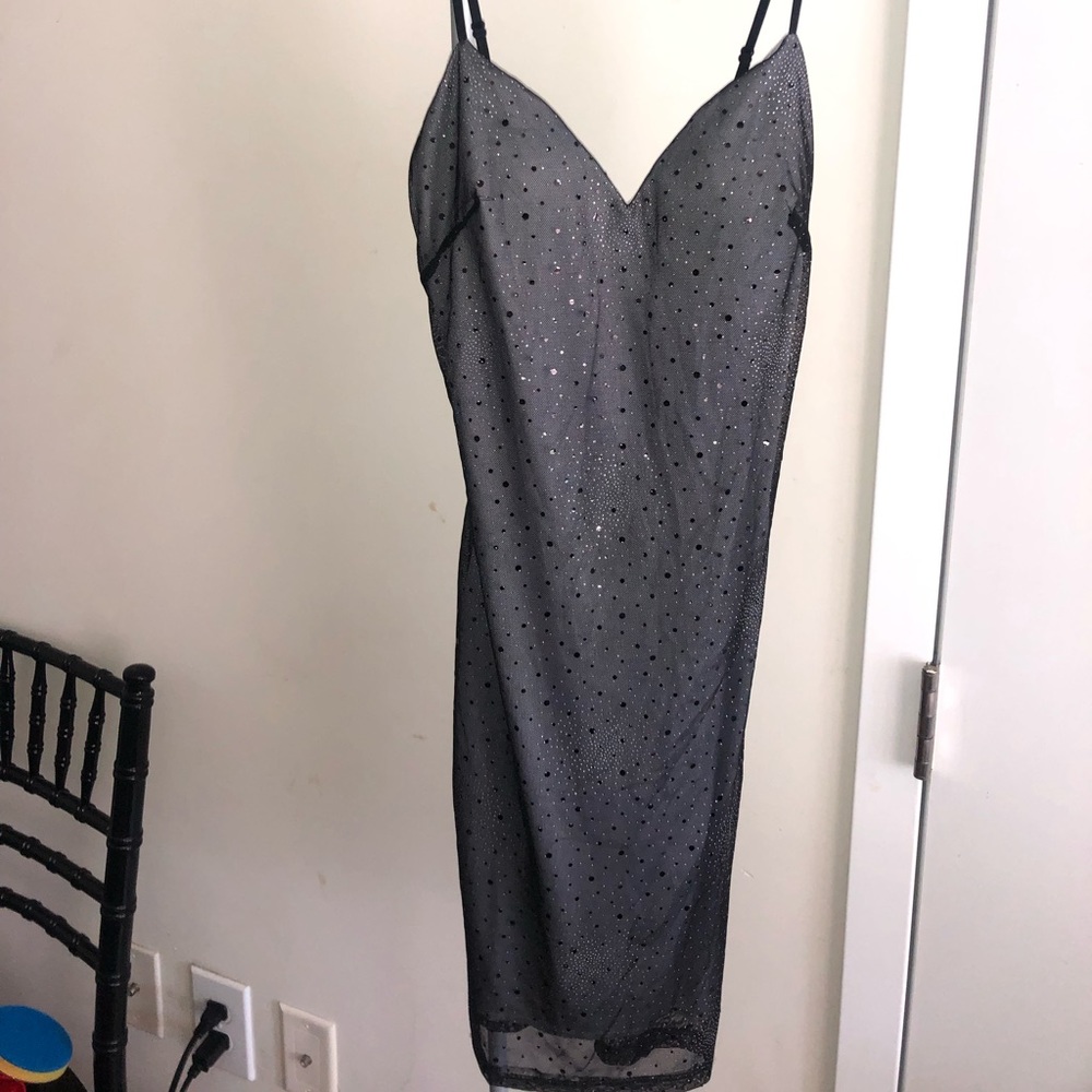 Glittery black love culture mini dress